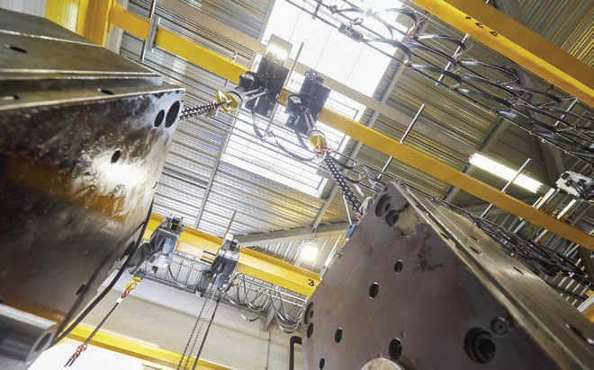 The two parts of a mould raised by hoists